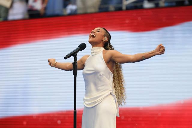 US singer Ariana DeBose sings the national anthem before the women's singles final tennis match between Belarus's Aryna Sabalenka and Kazakhstan's Elena Rybakina on day fourteen of the US Open tennis tournament at the USTA Billie Jean King National Tennis Center in New York City on September 12, 2026. (Photo by TIMOTHY A. CLARY / AFP)