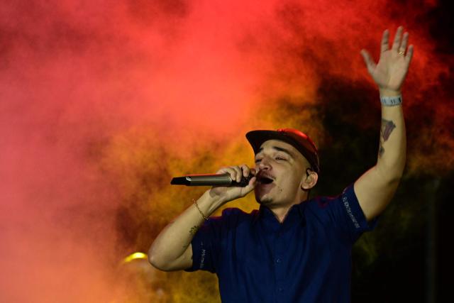 Brazilian singer Joao Gomes performs during the Rock in Rio music festival at Rio 2016 Olimpyc Park in Rio de Janeiro, Brazil September 12, 2026. (Photo by Pablo PORCIUNCULA / AFP)