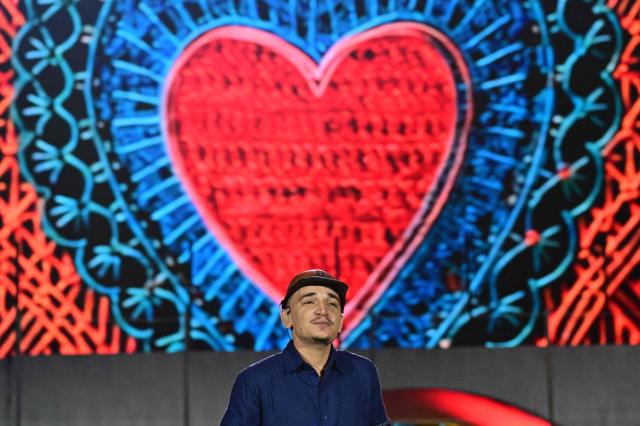 Brazilian singer Joao Gomes performs during the Rock in Rio music festival at Rio 2016 Olimpyc Park in Rio de Janeiro, Brazil September 12, 2026. (Photo by Pablo PORCIUNCULA / AFP)