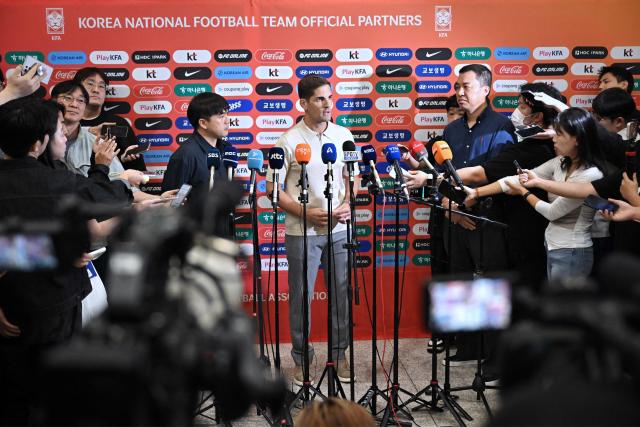 South Korea National Football Team’s interim coach Robert Moreno of Spain speaks to the media at Incheon International Airport on September 13, 2026. (Photo by Lillian SUWANRUMPHA / AFP)