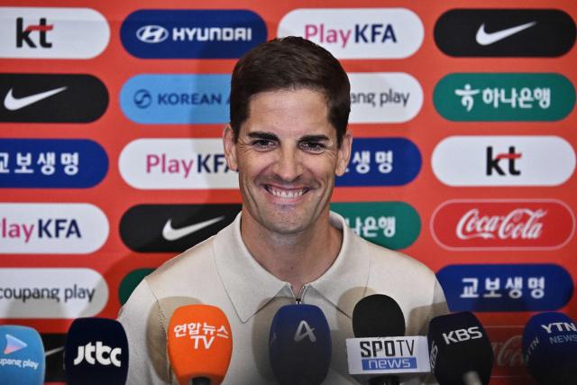 South Korea National Football Team’s interim coach Robert Moreno of Spain speaks to the media at Incheon International Airport on September 13, 2026. (Photo by Lillian SUWANRUMPHA / AFP)