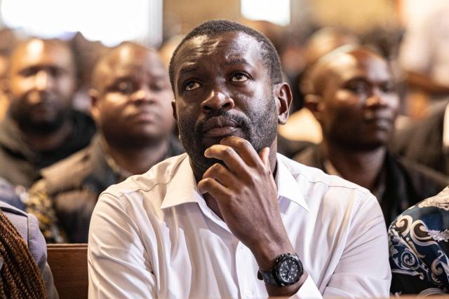 Nairobi Senator Edwin Sifuna attends a church service at the All Saints Cathedral, a head of the Linda Mwananchi (protect citizens) political rally in Nairobi on September 13, 2026. A heavy police presence was deployed in Nairobi for a rally by a rising opposition star on Sunday, following a wave of political violence in recent weeks.
Edwin Sifuna has emerged as the biggest threat to President William Ruto ahead of the latter's bid for re-election in August 2027.
Sifuna, 44, has built momentum by tapping into widespread anger over corruption and political violence, though others argue he is too young and inexperienced for the top office.
His rally began with a church visit in central Nairobi early Sunday, with hundreds of rowdy supporters already gathered outside and a large number of police officers maintaining a perimeter, AFP journalists saw. (Photo by SIMON MAINA / AFP)