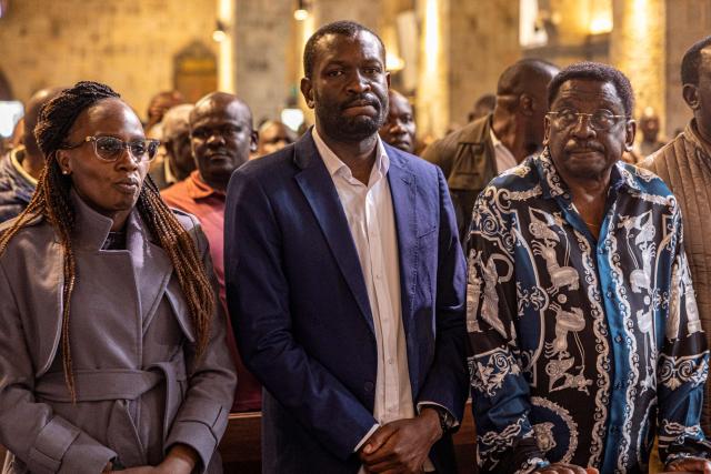Nairobi Senator Edwin Sifuna (C) attends a church service at the All Saints Cathedral,  ahead of the Linda Mwananchi (protect citizens) political rally in Nairobi on September 13, 2026. A heavy police presence was deployed in Nairobi for a rally by a rising opposition star on Sunday, following a wave of political violence in recent weeks.
Edwin Sifuna has emerged as the biggest threat to President William Ruto ahead of the latter's bid for re-election in August 2027.
Sifuna, 44, has built momentum by tapping into widespread anger over corruption and political violence, though others argue he is too young and inexperienced for the top office.
His rally began with a church visit in central Nairobi early Sunday, with hundreds of rowdy supporters already gathered outside and a large number of police officers maintaining a perimeter, AFP journalists saw. (Photo by SIMON MAINA / AFP)