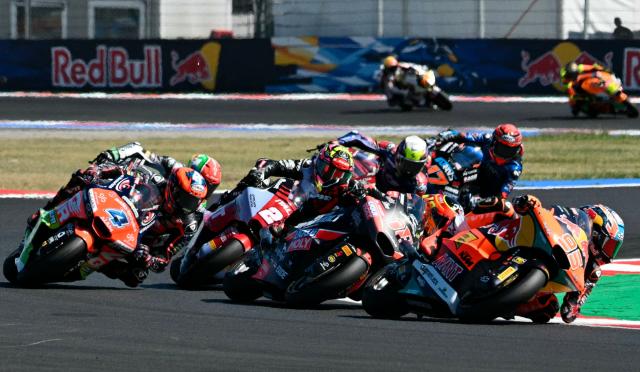 Red Bull KTM Ajo's Dutch rider Collin Veijer (R) competes during the San Marino Moto2 race at the Misano World Circuit Marco Simoncelli, in Misano Adriatico, northern Italy on September 13, 2026. (Photo by Andreas SOLARO / AFP)