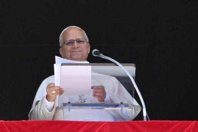 Pope Leo XIV addresses the crowd from the window of the apostolic palace overlooking St Peter's Square during his Sunday Angelus prayer at the Vatican on September 13, 2026 (Photo by Alberto PIZZOLI / AFP)