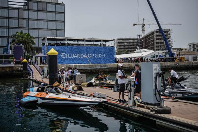 Mechanics prepare their electric raceboats to compete in the race off during the E1 Luanda GP 2026 at the Marina Baia in Luanda on September 13, 2026. (Photo by Phill Magakoe / AFP)