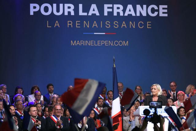 President of the far-right Rassemblement National (RN) parliamentary group and 2027 French presidential candidate Marine Le Pen (R) delivers a speech during a rally for the start of the new political year in Henin-Beaumont, northern France, on September 13, 2026. (Photo by Thomas SAMSON / AFP)