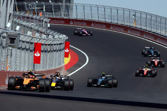 McLaren-Mercedes' British driver Lando Norris leads at the start of the Spanish Formula One Grand Prix at the Madring circuit on September 13, 2026 in Madrid. (Photo by Oscar DEL POZO / AFP)