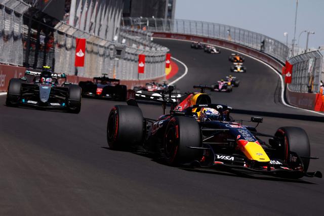 Red Bull Racing's Dutch driver Max Verstappen (R) competes in the Spanish Formula One Grand Prix at the Madring circuit on September 13, 2026 in Madrid. (Photo by Oscar DEL POZO / AFP)