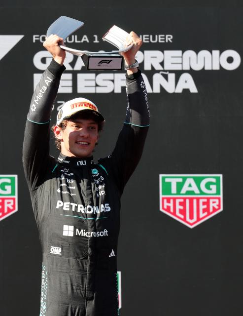 Mercedes' Italian driver Kimi Antonelli celebrates on the podium after the Spanish Formula One Grand Prix at the Madring circuit on September 13, 2026 in Madrid. (Photo by Thomas COEX / AFP)