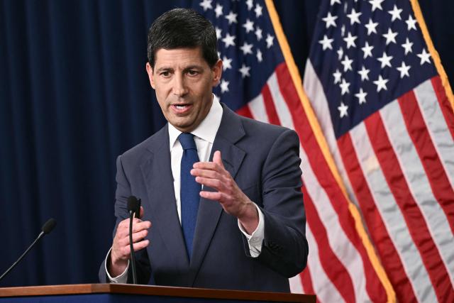 (FILES) Chair of the Federal Reserve Kevin Warsh speaks during a news conference at the William McChesney Martin Jr. Federal Reserve Board Building in Washington, DC, on July 29, 2026. The US Federal Reserve goes into a key rate-setting meeting this week, with the Federal Open Market Committee (FOMC) meeting scheduled for September 1516, 2026. Markets are expecting policymakers to pull the trigger on a rate hike to tackle persistently high inflation -- and analysts say central bank chief Kevin Warsh's credibility is on the line. The world's largest economy has been dealing with years of higher-than-target inflation, and prices have surged in the wake of US President Donald Trump's war on Iran, his signature tariff policies and the ongoing AI boom. (Photo by Brendan SMIALOWSKI / AFP)