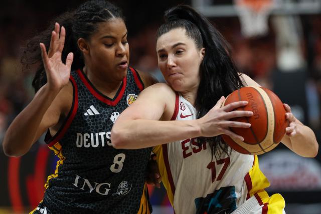 Spain's center #17 Megan Gustafson and Germany's power forward #08 Nyara Sabally vie for the ball during the 2026 FIBA Women's Basketball World Cup third place game between Spain and Germany in Berlin on September 13, 2026. (Photo by Odd ANDERSEN / AFP)