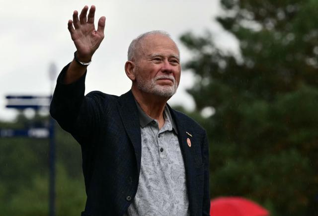 Chairman of PING John Solheim gestures during the trophy ceremony after Team Europe's victory on the final day of the 2026 Solheim Cup biennial team golf competition on The Bernardus Golf Course at Cromvoirt, some 80kms south-east of Rotterdam on September 13, 2026. (Photo by NICOLAS TUCAT / AFP)