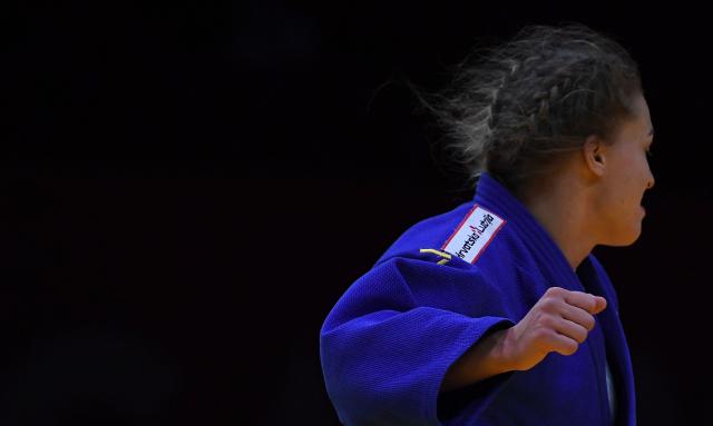 Croatia's Petrunjela Pavic celebrates after defeating Japan's Mao Izumi and winning the gold medal in the women's under 78kg category bout at the Hungary Grand Slam judo tournament, part of the IJF World Judo Tour, in Budapest on September 13, 2026. (Photo by Ferenc ISZA / AFP)
