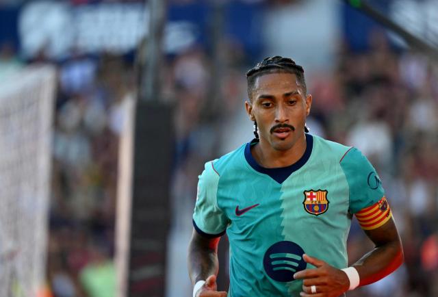 Barcelona's Brazilian forward #11 Raphinha is pictured during the Spanish league football match between Levante UD and FC Barcelona at Ciutat de Valencia Stadium in Valencia on September 13, 2026. (Photo by JOSE JORDAN / AFP)