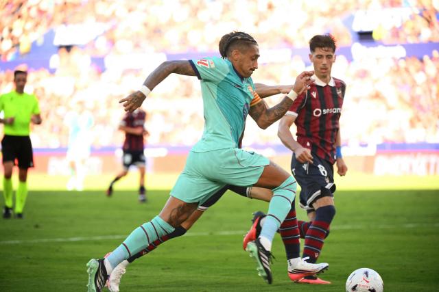 Barcelona's Brazilian forward #11 Raphinha controls the ball during the Spanish league football match between Levante UD and FC Barcelona at Ciutat de Valencia Stadium in Valencia on September 13, 2026. (Photo by JOSE JORDAN / AFP)