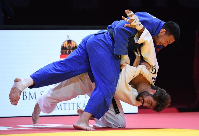 Bulgaria's Boris Georgiev (white) and Russia's Niiaz Bilalov compete in the men's under 100kg category bronze medal bout at the Hungary Grand Slam judo tournament, part of the IJF World Judo Tour, in Budapest on September 13, 2026. (Photo by Ferenc ISZA / AFP)