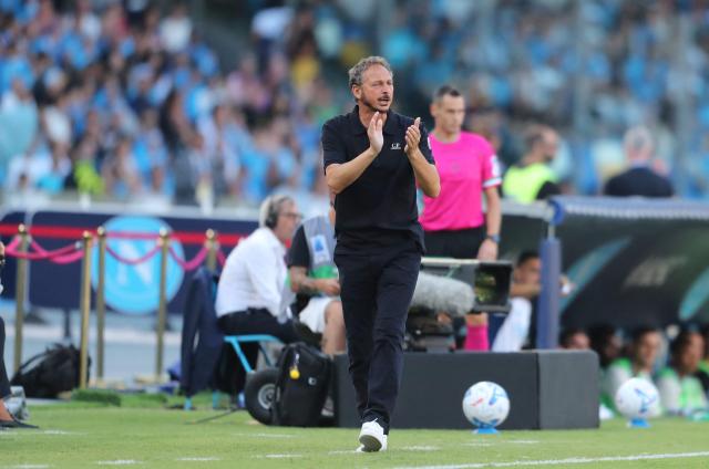 Bologna's Italian second coach Andrea Tarozzi applauds during the Italian Serie A football match SSC Napoli vs Bologna FC 1909 at the Diego Armando Maradona Stadium on September 13, 2026. (Photo by CARLO HERMANN / AFP)