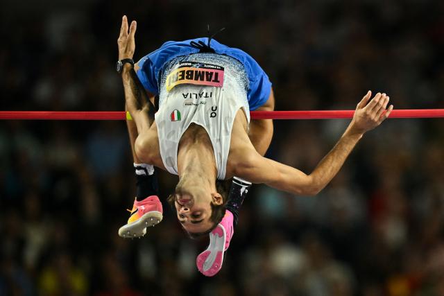 Italy's Gianmarco Tamberi competes in men's high jump final during the World Athletics Ultimate Championship at the Gyula Zsivotzky National Athletics Centre, in Budapest on September 13, 2026. (Photo by Ben STANSALL / AFP)