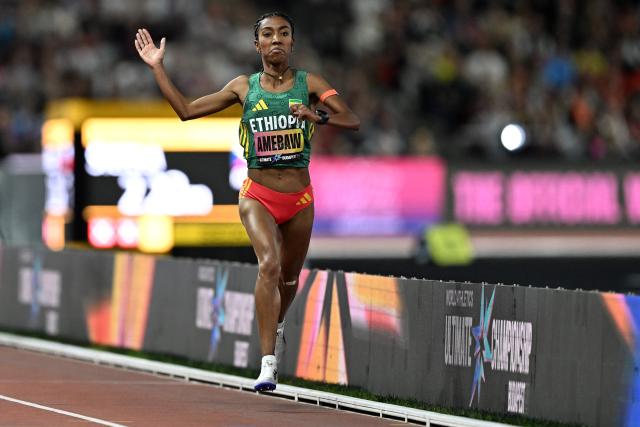Ethiopia's Likina Amebaw celebrates her victory in the women's 5000m final during the World Athletics Ultimate Championship at the Gyula Zsivotzky National Athletics Centre, in Budapest on September 13, 2026. (Photo by Jewel SAMAD / AFP)