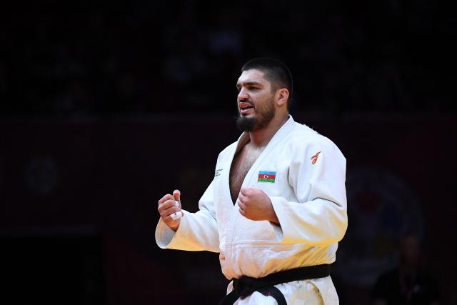 Azerbaijan’s Dzhamal Gamzatkhanov celebrates after defeating Ukraine’s Yakiv Khammo in the men’s over 100kg bronze medal contest at the Hungary Grand Slam 2026 judo tournament in Budapest, Hungary, on September 13, 2026. (Photo by Ferenc ISZA / AFP)