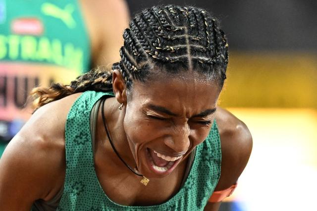 Ethiopia's Likina Amebaw celebrates her victory in the women's 5000m final during the World Athletics Ultimate Championship at the Gyula Zsivotzky National Athletics Centre, in Budapest on September 13, 2026. (Photo by Jewel SAMAD / AFP)