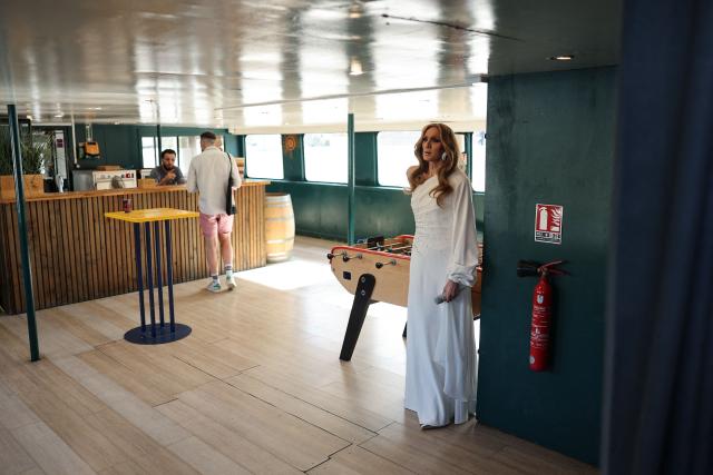 French tribute artist Fabien Pierrel waits backstage to perform on board a Celine Dion tribute cruise on the Seine river, held to mark the start of the singer's Paris concert residency, in Paris on September 13, 2026. The Canadian singer is performing a series of concerts at the Plenitude Arena between September 12 and October 17, 2026, her first live shows since a hiatus caused by health issues. (Photo by Anne-Christine POUJOULAT / AFP)