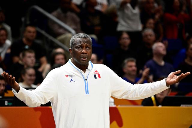 France's head coach Jean-Aime Toupane gestures during the 2026 FIBA Women’s Basketball World Cup final game between the United States and France in Berlin on September 13, 2026. (Photo by Tobias SCHWARZ / AFP)