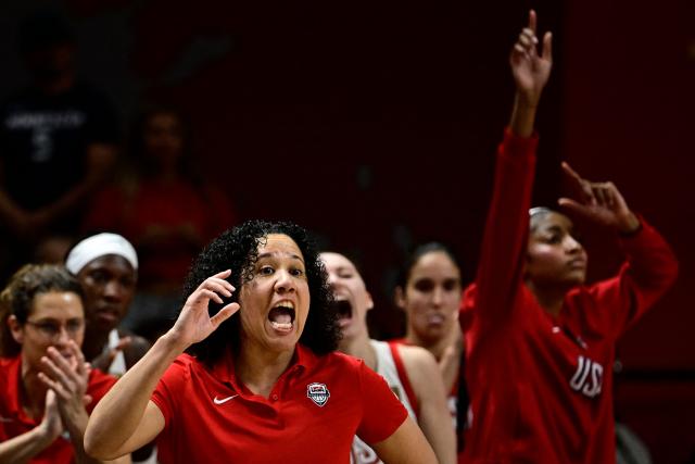 USA's head coach Kara Lawson (C) gestures during the 2026 FIBA Women’s Basketball World Cup final game between the United States and France in Berlin on September 13, 2026. (Photo by Tobias SCHWARZ / AFP)