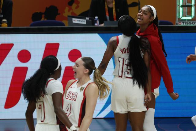 US'players celebrate during the 2026 FIBA Women’s Basketball World Cup final game between the United States and France in Berlin on September 13, 2026. (Photo by Odd ANDERSEN / AFP)