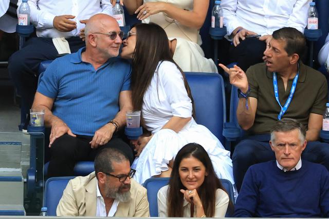 Amazon executive chairman Jeff Bezos (upper L) and Lauren Sanchez Bezos attend the men's singles final tennis match between USA's Ben Shelton and Germany's Alexander Zverev on day fifteen of the US Open tennis tournament at the USTA Billie Jean King National Tennis Center in New York City on September 13, 2026. (Photo by TIMOTHY A. CLARY / AFP)