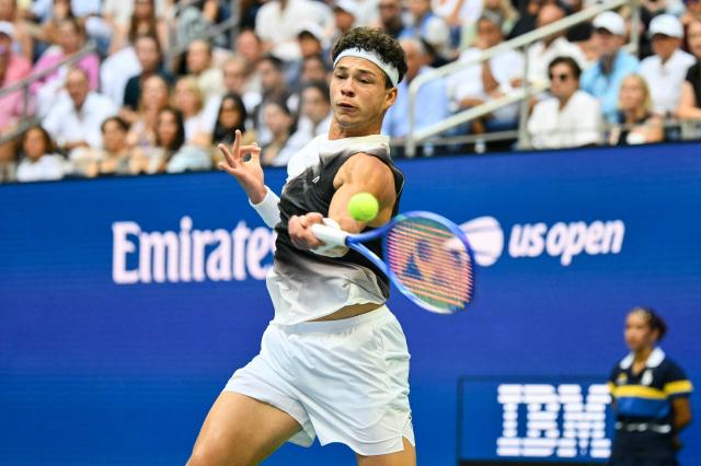 USA's Ben Shelton plays a return to Germany's Alexander Zverev during the men's singles final tennis match on day fifteen of the US Open tennis tournament at the USTA Billie Jean King National Tennis Center in New York City on September 13, 2026. (Photo by ANGELA WEISS / AFP)