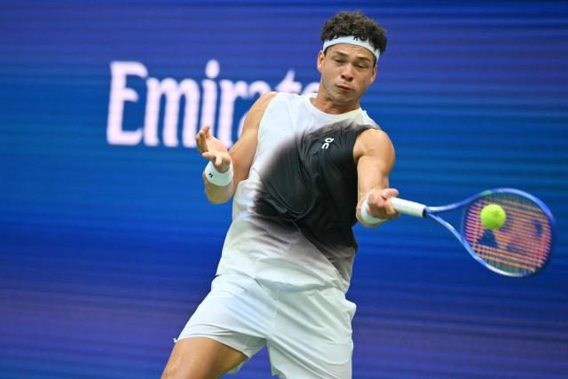 USA's Ben Shelton hits a return to Germany's Alexander Zverev during the men's singles final tennis match on day fifteen of the US Open tennis tournament at the USTA Billie Jean King National Tennis Center in New York on September 13, 2026. (Photo by ANGELA WEISS / AFP)