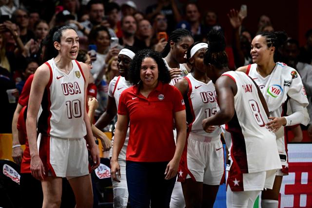 USA's team celebrates after the 2026 FIBA Women’s Basketball World Cup final game between the United States and France in Berlin on September 13, 2026. (Photo by Tobias SCHWARZ / AFP)