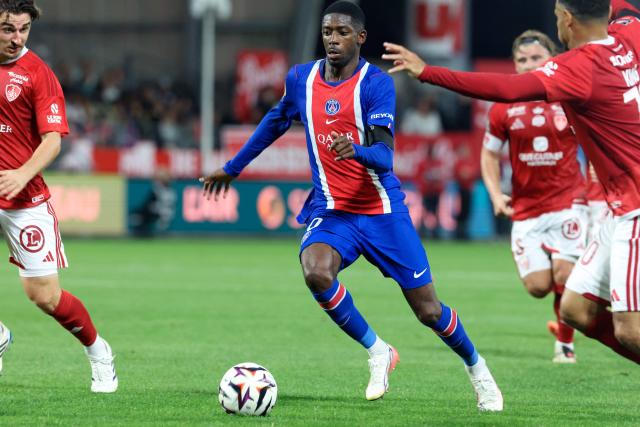 Paris Saint-Germain's French forward #10 Ousmane Dembele runs with the ball during the French L1 football match between Stade Brestois 29 and Paris Saint-Germain (PSG) at the Stade Francis-Le Ble in Brest on September 13, 2026.  (Photo by FRED TANNEAU / AFP)