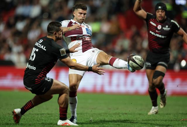 Bordeaux-Bègles' French fly-half Matthieu Jalibert (C) kicks the ball during the French Top 14 rugby union match between Stade Toulousain and Bordeaux-Begles at the Stade Ernest-Wallon in Toulouse, southwestern France on September 13, 2026.  (Photo by Valentine CHAPUIS / AFP)