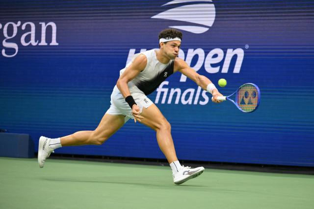 USA's Ben Shelton hits a return against Germany's Alexander Zverev during the men's singles final tennis match on day fifteen of the US Open tennis tournament at the USTA Billie Jean King National Tennis Center in New York City on September 13, 2026. (Photo by ANGELA WEISS / AFP)