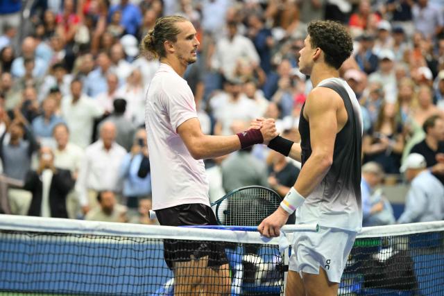 USA's Ben Shelton (R) shakes Germany's Alexander Zverev's hand after the men's singles final tennis match on day fifteen of the US Open tennis tournament at the USTA Billie Jean King National Tennis Center in New York City on September 13, 2026. (Photo by ANGELA WEISS / AFP)
