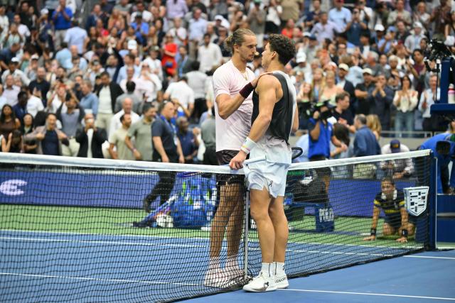 USA's Ben Shelton (R) congratulates Germany's Alexander Zverev after the men's singles final tennis match on day fifteen of the US Open tennis tournament at the USTA Billie Jean King National Tennis Center in New York City on September 13, 2026. (Photo by ANGELA WEISS / AFP)