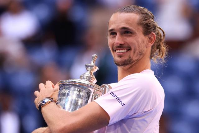 Germany's Alexander Zverev holds the trophy after defeating USA's Ben Shelton in the men's singles final tennis match on day fifteen of the US Open tennis tournament at the USTA Billie Jean King National Tennis Center in New York on September 13, 2026. (Photo by CHARLY TRIBALLEAU / AFP)