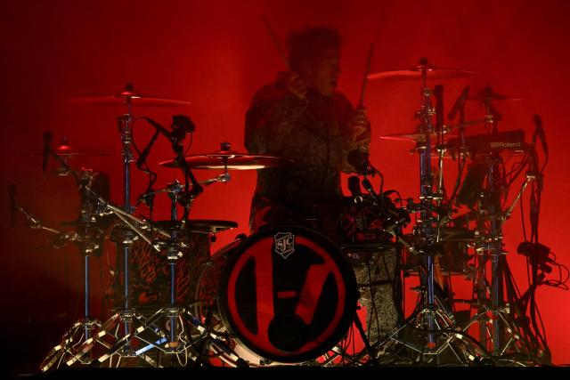 Drummer Josh Dun from the band Twenty One Pilots performs during the last night of Rock in Rio music festival at the Rio 2016 Olympic Park in Rio de Janeiro, Brazil on September 13, 2026. (Photo by MAURO PIMENTEL / AFP)
