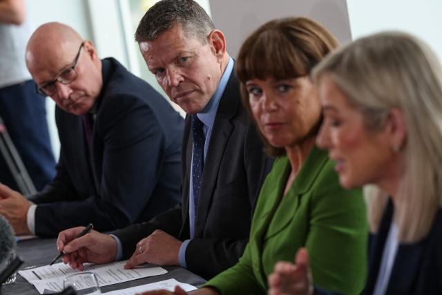 (L to R) Scottish Nationalist Party (SNP) leader John Swinney, Rhun ap Iorwerth of Plaid Cymru in Wales, Mary Lou McDonald, president of Irish Republicans Sinn Fein and Michelle O'Neill, vice president of Irish Republicans Sinn Fein speak to the media as they attend a meeting in Cardiff, Wales on September 14, 2026, to press for self-determination votes in their territories. The leaders of the main Scottish, Welsh and Northern Irish separatist parties were to hold rare talks on September 14 aiming to advance their campaigns to break away from Britain, they announced in a statement. (Photo by Adrian Dennis / AFP)