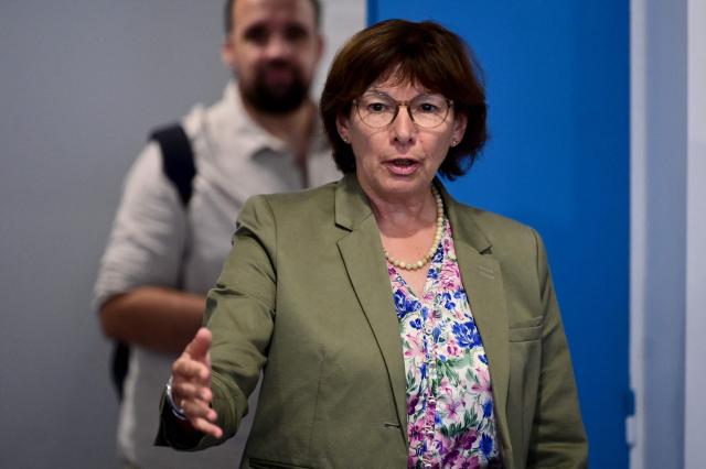 Herault's Prefect Chantal Mauchet arrives for a meeting with fishermen protesting rising fuel costs and worsening working conditions in Sete, Southern France, on September 14, 2026. (Photo by Gabriel BOUYS / AFP)