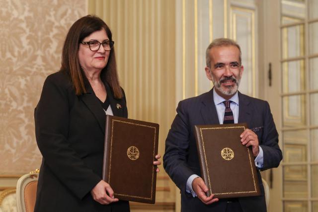 Portuguese Foreign Affairs Minister Paulo Rangel and Palestinian Foreign Minister Varsen Aghabekian Shahin (L) pose after signing the memorandum of Understanding on Political Consultations and memorandum of Understanding on Diplomatic Training after their meeting at Necessitude Palace in Lisbon on September 14, 2026. (Photo by PATRICIA DE MELO MOREIRA / AFP)