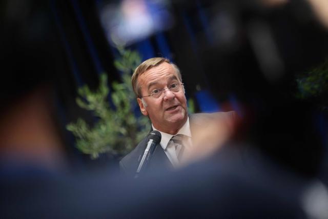 German Defence Minister Boris Pistorius (C) attends a press conference during a ceremony to lay the keel for the third fleet service vessel, at the Peene-Werft shipyard in Wolgast, northeastern Germany, on September 14, 2026. (Photo by Danny Gohlke / AFP)
