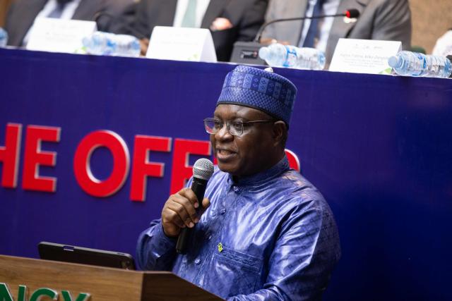 Umaru Kwairanga the group chairman of the Nigerian Exchange group (NGX Group) addresses the audience during the opening of the Dangote Refinery's inital public offering (IPO) at the Nigerian Exchange Group in Lagos, on September 14, 2026. Nigerian billionaire Aliko Dangote on Monday launched what is slated as Africa's biggest initial public offering, which aims to raise $1.6 billion from his mega oil refinery.
Describing it as an "historic day", Dangote said in a statement that the IPO was "not simply about listing a company. It is about listing a new possibility for Nigeria, and for Africa". (Photo by Temiloluwa Johnson / AFP)