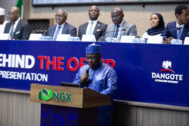 Umaru Kwairanga the group chairman of the Nigerian Exchange group (NGX Group) addresses the audience during the opening of the Dangote Refinery's inital public offering (IPO) at the Nigerian Exchange Group in Lagos, on September 14, 2026. Nigerian billionaire Aliko Dangote on Monday launched what is slated as Africa's biggest initial public offering, which aims to raise $1.6 billion from his mega oil refinery.
Describing it as an "historic day", Dangote said in a statement that the IPO was "not simply about listing a company. It is about listing a new possibility for Nigeria, and for Africa". (Photo by Temiloluwa Johnson / AFP)