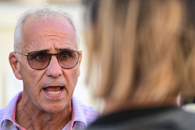 Bernard Perez, President of the Occitanie Fisheries Committee, speaks to reporters after a meeting with Herault's Prefect Chantal Mauchet as fishermen protest rising fuel costs and worsening working conditions in Sete, southern France, on September 14, 2026. Mediterranean fishermen launched a joint protest movement on September 14, 2026 over surging fuel costs and worsening working conditions, with a demonstration held outside the maritime affairs office in Sete and fishing boats blocking the port of Port-Vendres. (Photo by Gabriel BOUYS / AFP)