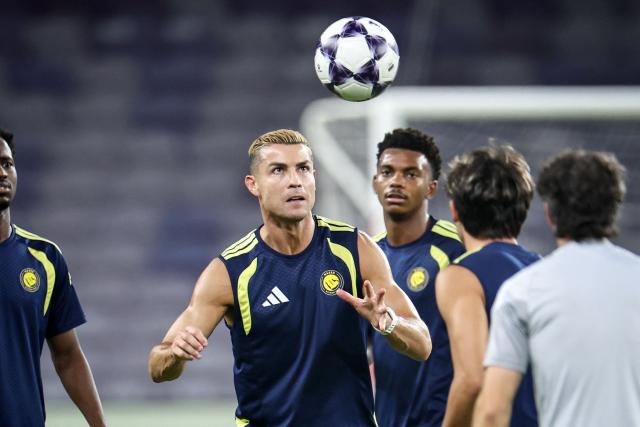 Al-Nassr's Portuguese forward #07 Cristiano Ronaldo eye the ball during a training session on the eve of the AFC Champions League Elite (ACL) match between Al-Ain FC and Saudi's Al-Nassr FC, at the Azza Bin Zayed stadium in al-Ain on September 14, 2026. (Photo by FADEL SENNA / AFP)