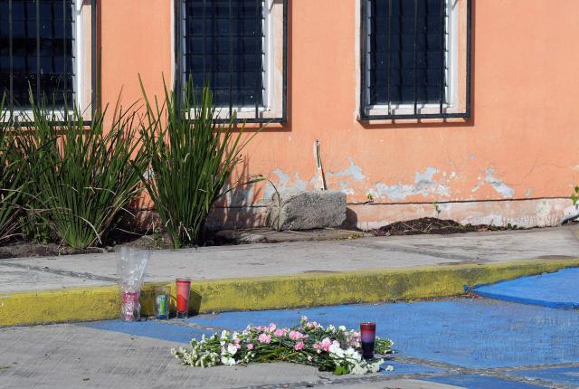 A view of a tribute in honor to Claudia Tacoronte Aguilera, a Spanish student who was murdered at the entrance to the House of Culture in Cuautla, Morelos state, Mexico on September 14, 2026. A Spanish college student was murdered in Mexico, where she was participating in an exchange program, local authorities reported on September 14, 2026. Claudia Tacoronte Aguilera, 21, was stabbed on the night of September 12 in Cuautla, less than a two-hour drive from Mexico City. The crime in which she was the victim of "an alleged robbery involving a knife," according to the local cultural center, is under investigation as a suspected femicide. (Photo by Miguel BAÑUELOS / AFP)